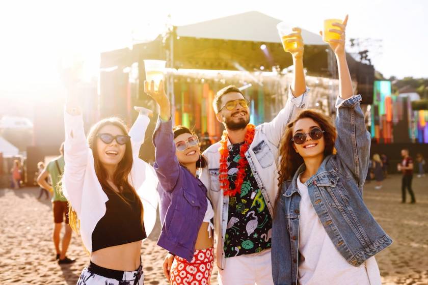 friends at beach concert