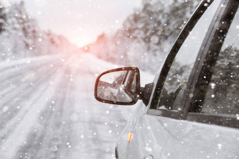 car driving on snowy road