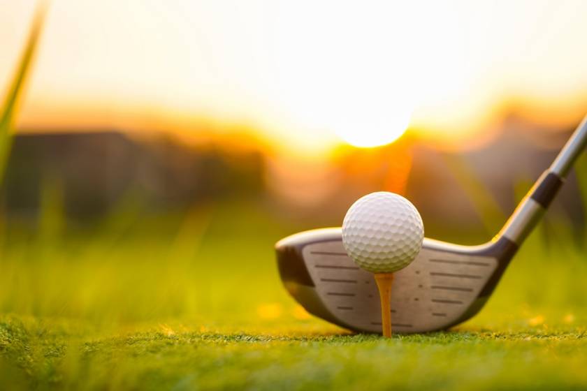 close up of golf ball on a tee