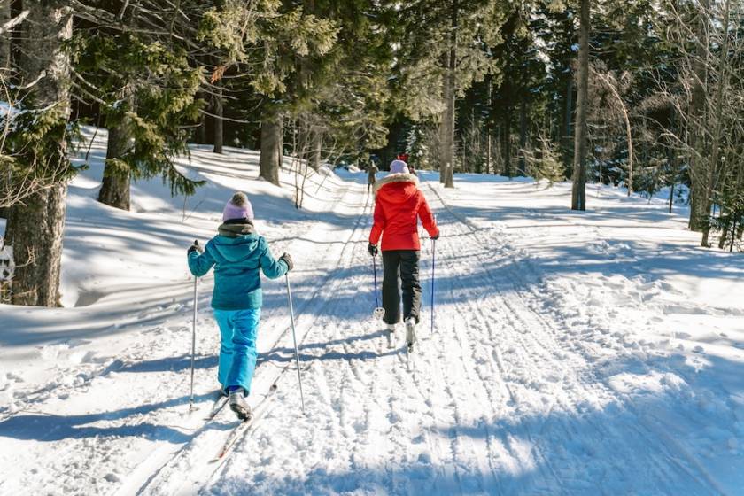 two people on a cross country ski trail in tahoe